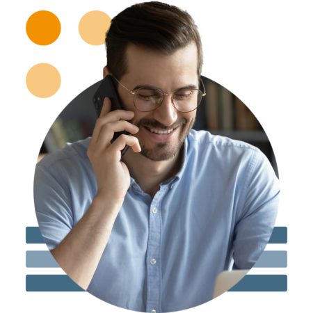 Image of a smiling business person talking on a mobile phone