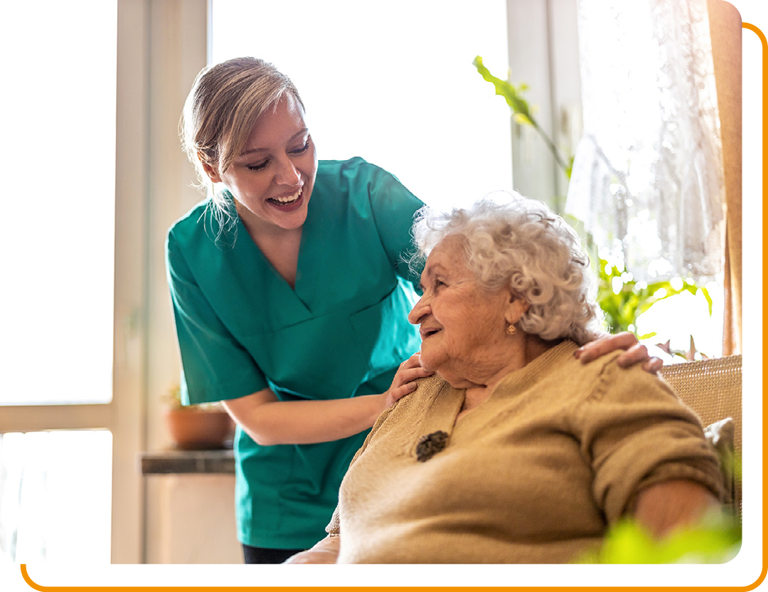 Image of a carer with an elderly patient