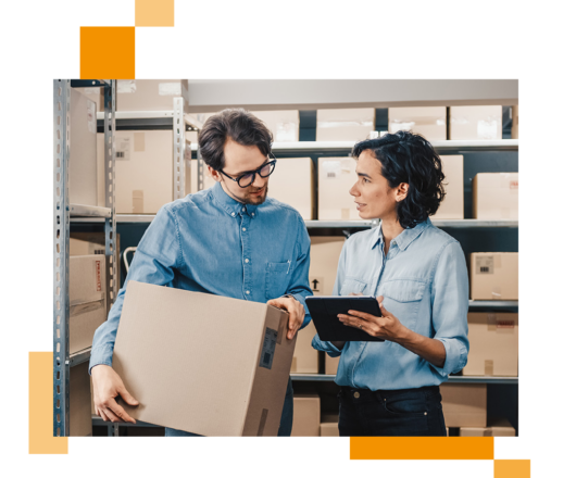 Image of two retail workers in a stock room working on a tablet