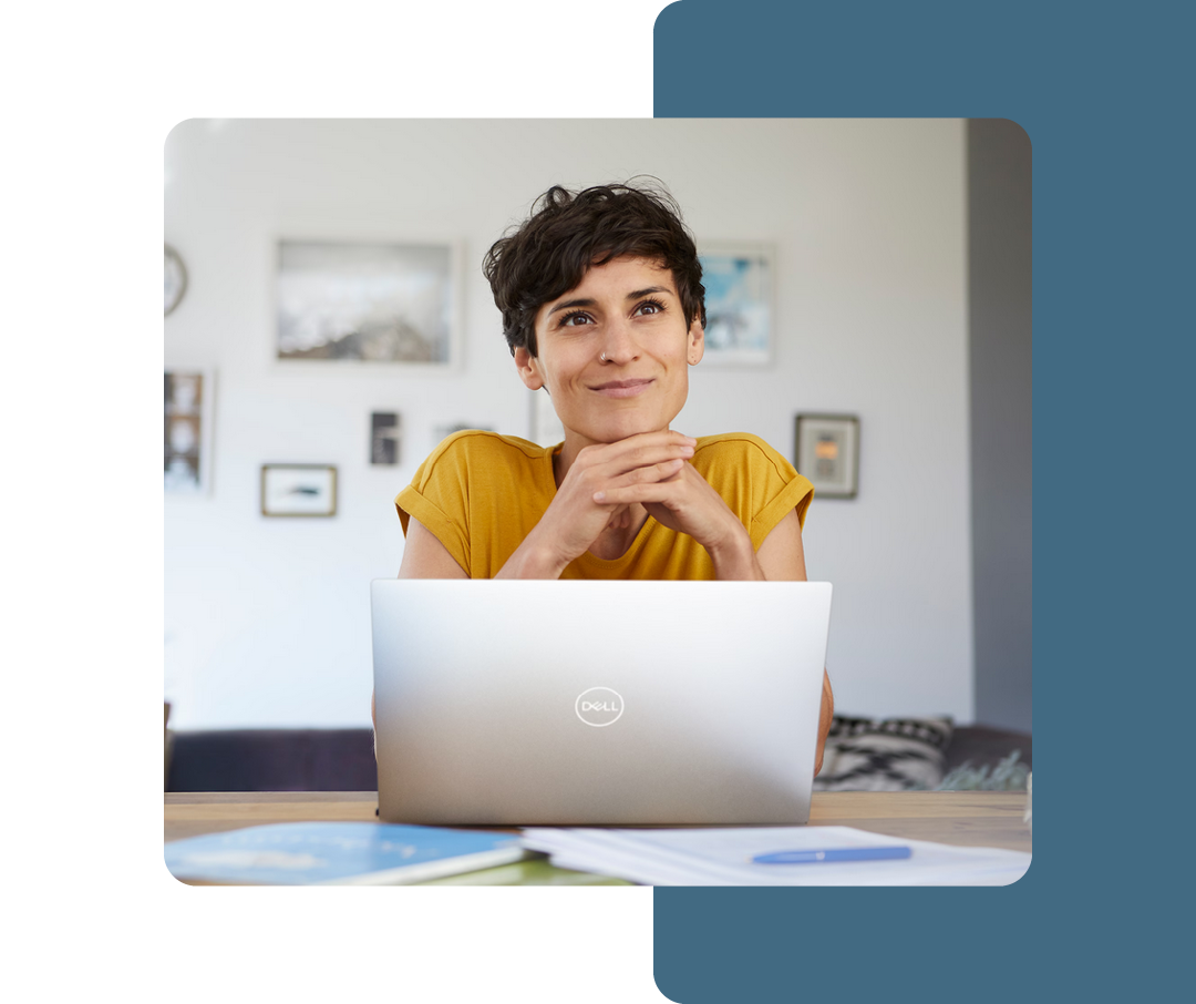 Image of a person working on a Dell laptop