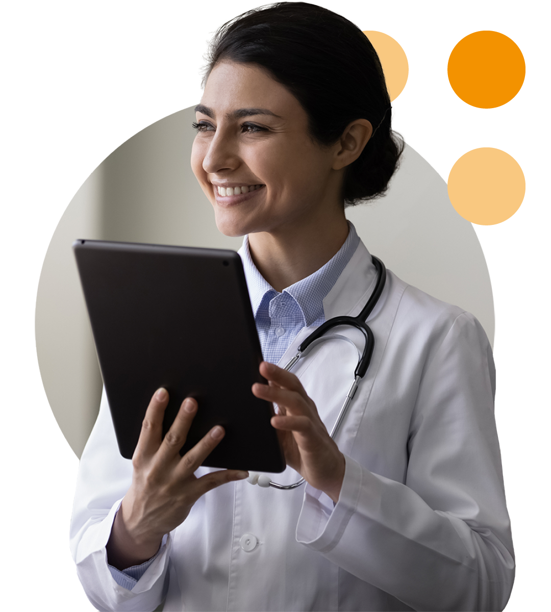 Image of a smiling doctor holding a tablet