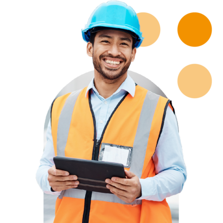 Image of a smiling construction manager holding a tablet