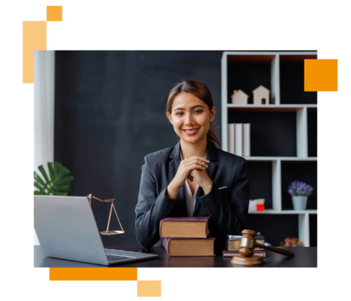 Image of a legal professional sat at a desk