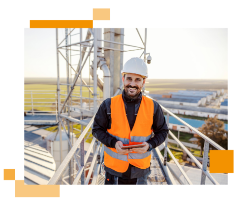 Image of a telecommunications engineer stood at a telephone mast