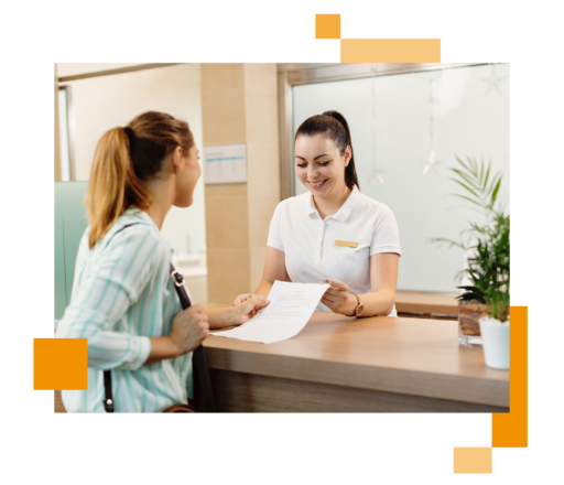 Image of a person working at a leisure centre serving a customer