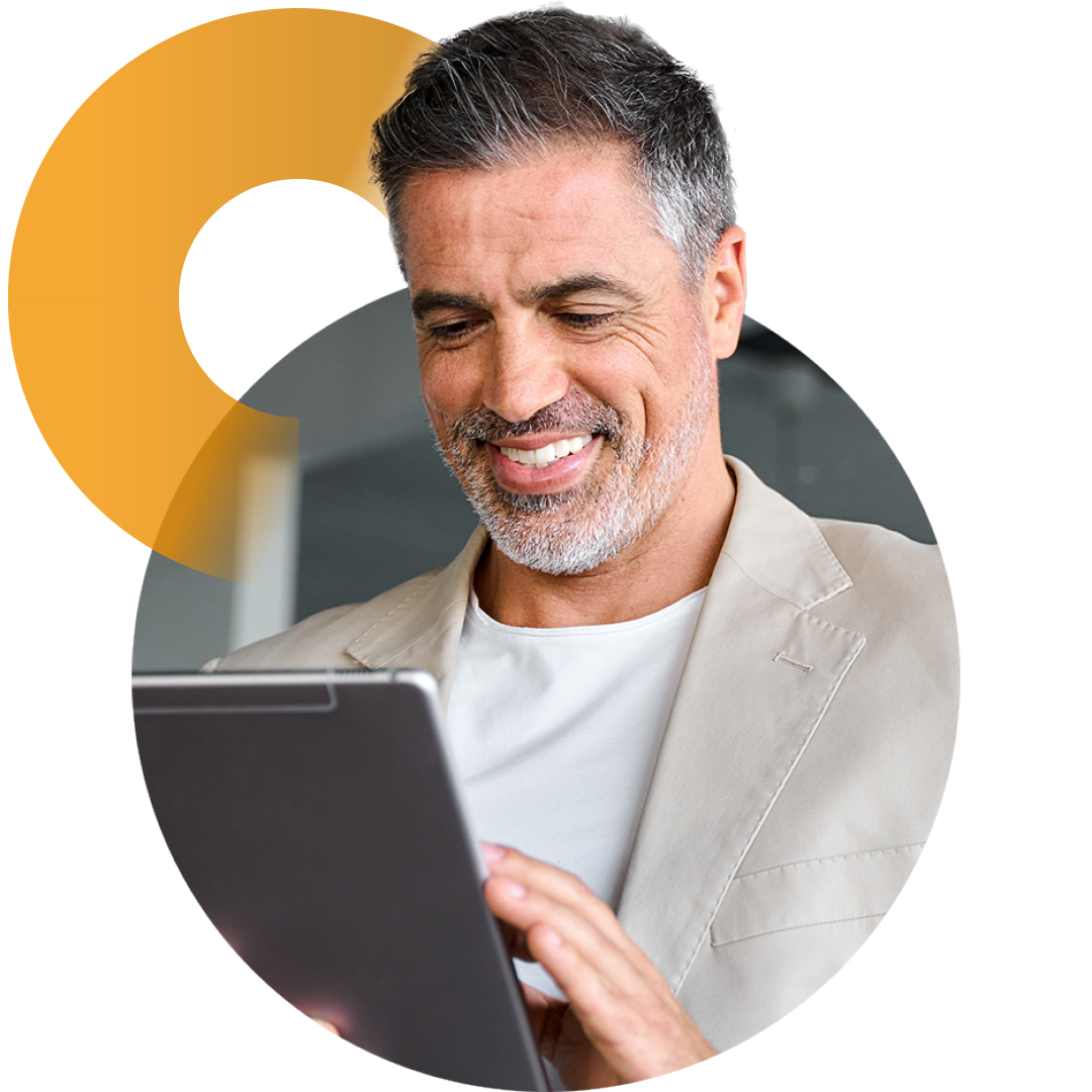 Image of a smiling business professional working on a tablet