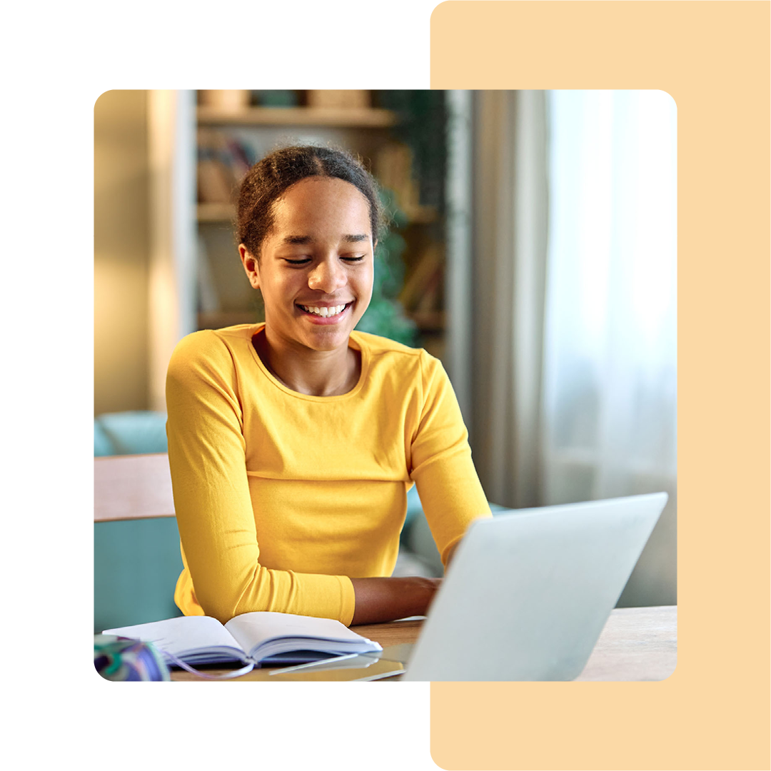 Image of a person working on a laptop