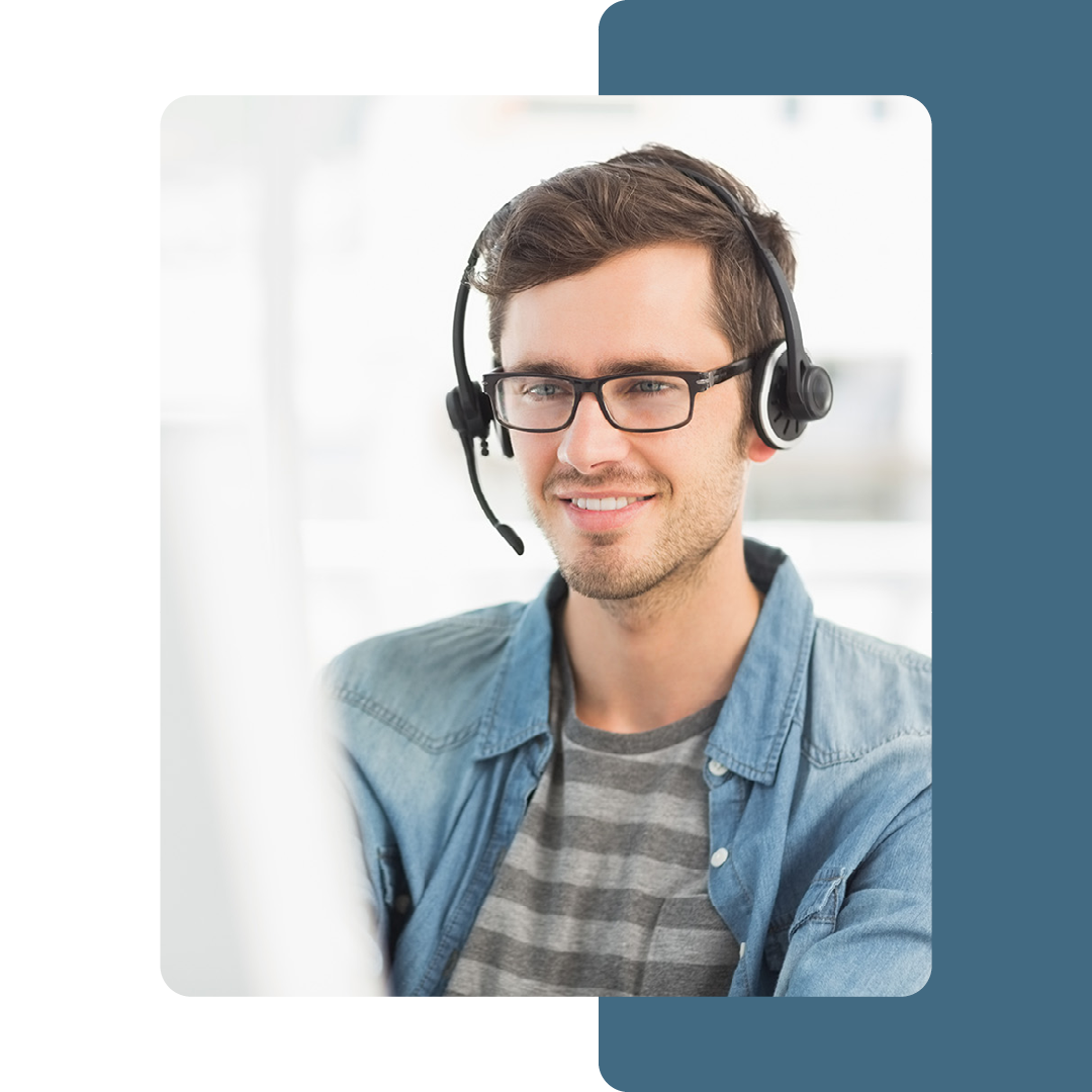 Image of a smiling IT support professional talking on a headset