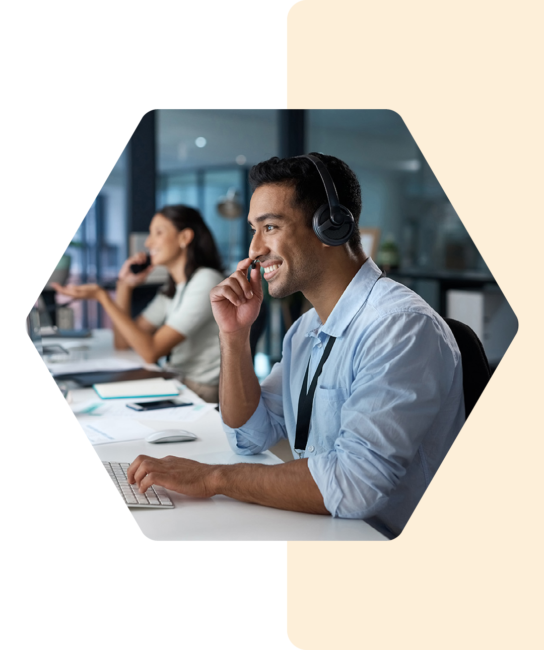 Image of a smiling IT professional talking on a headset