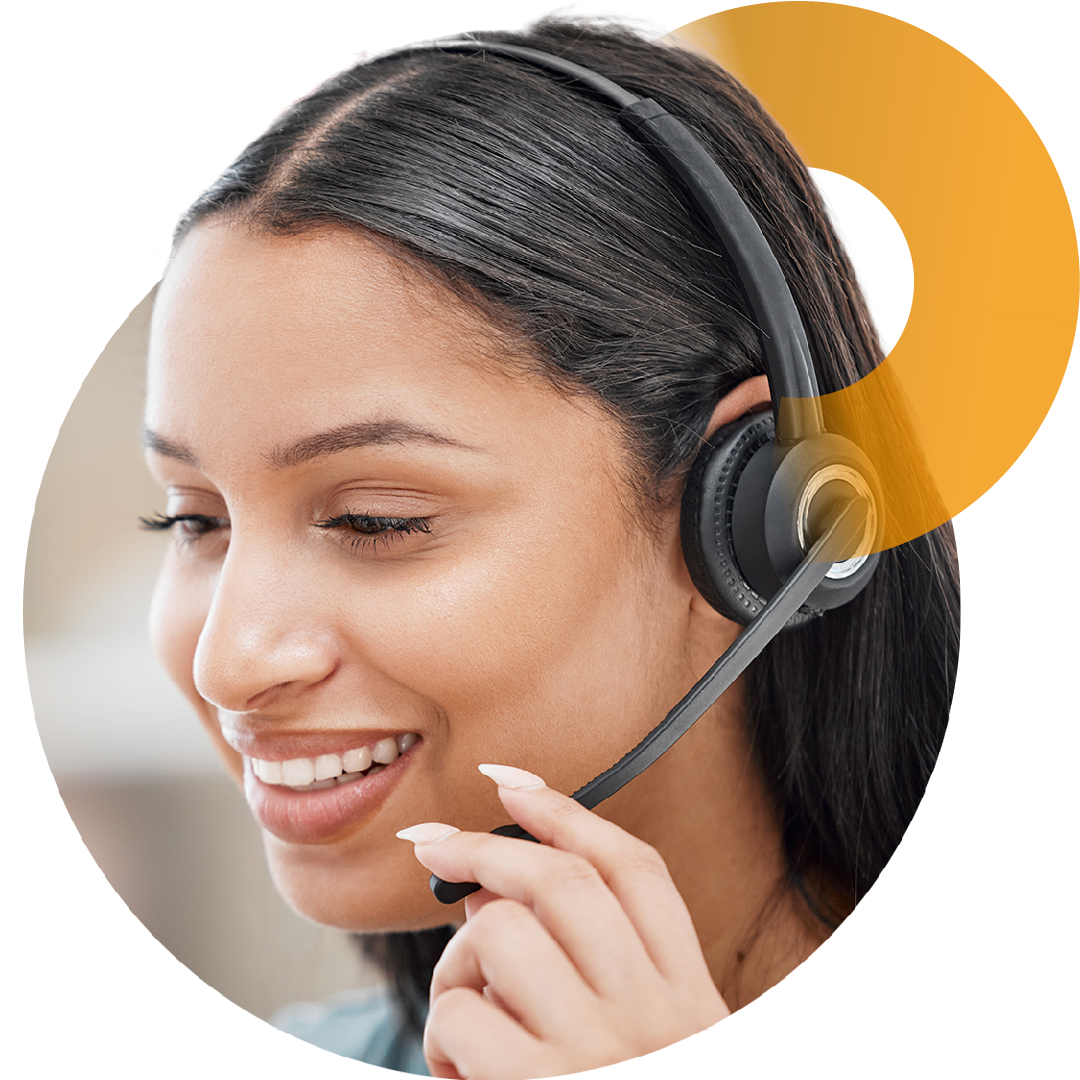 Image of a smiling person talking on a headset