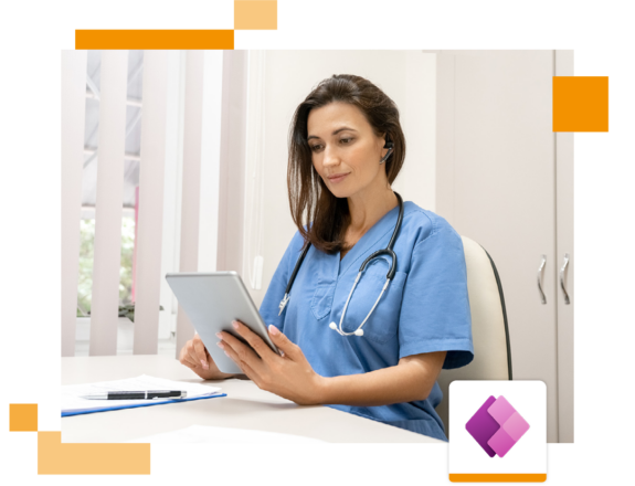 Image of a doctor sat in an office holding a tablet