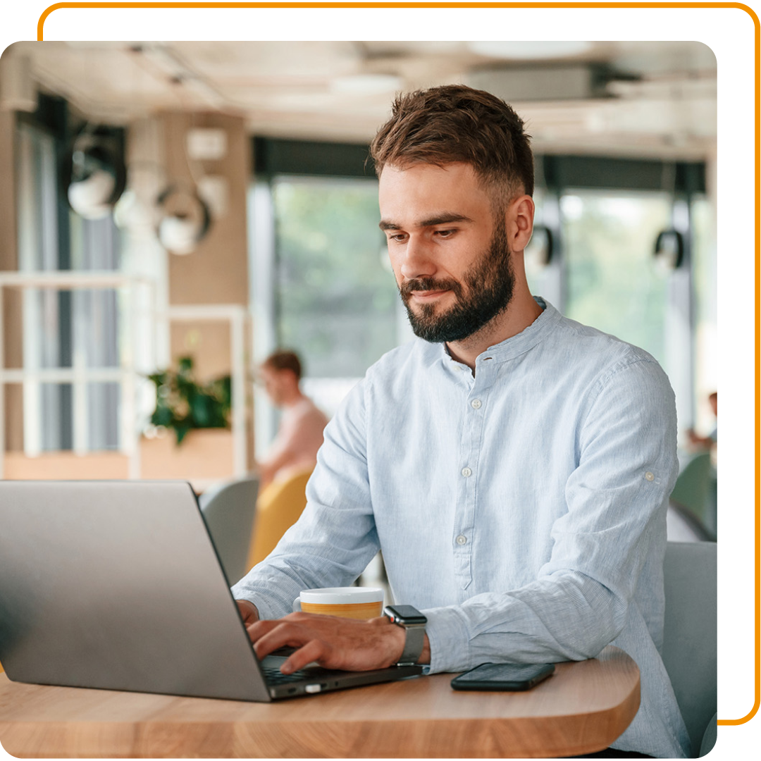 Image of a person working on a laptop