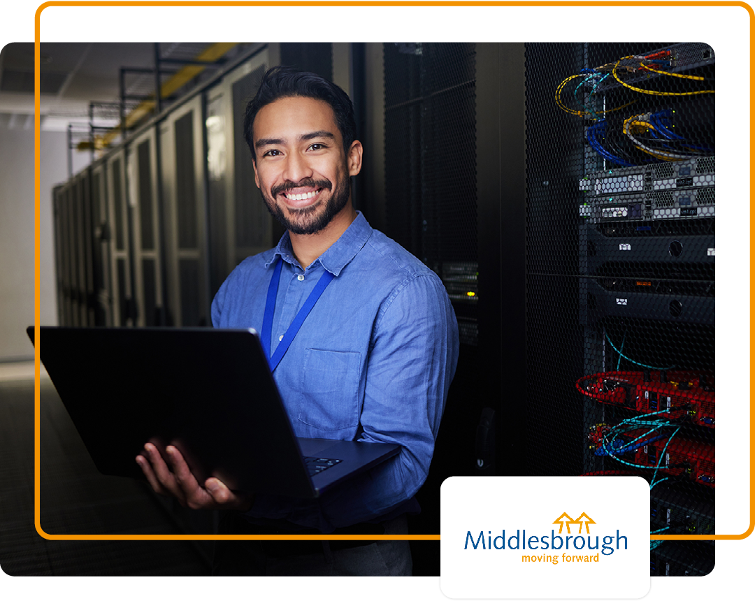 Image of a smiling IT professional in a server room with the Middlesbrough Council logo