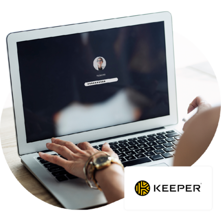 Image of a person logging into their laptop with the Keeper logo