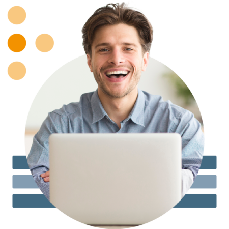 Image of a smiling person working on a laptop