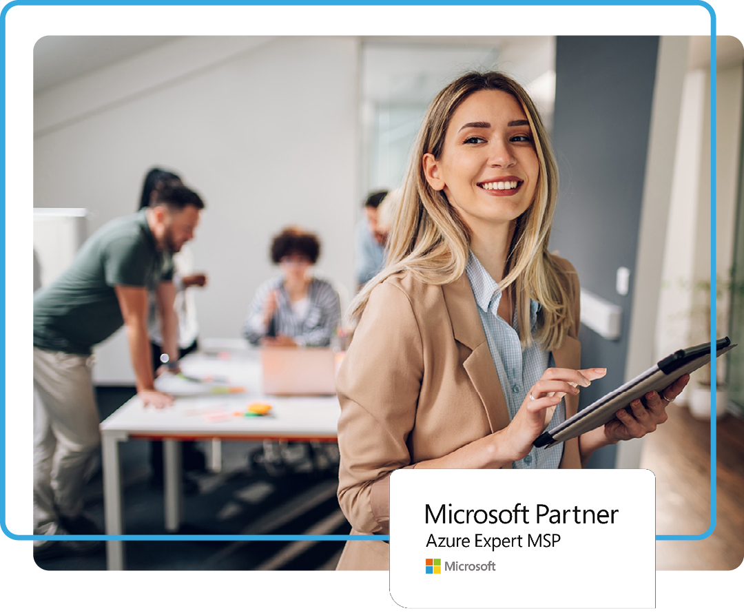 Image of a smiling professional in an office with our Microsoft Azure MSP logo