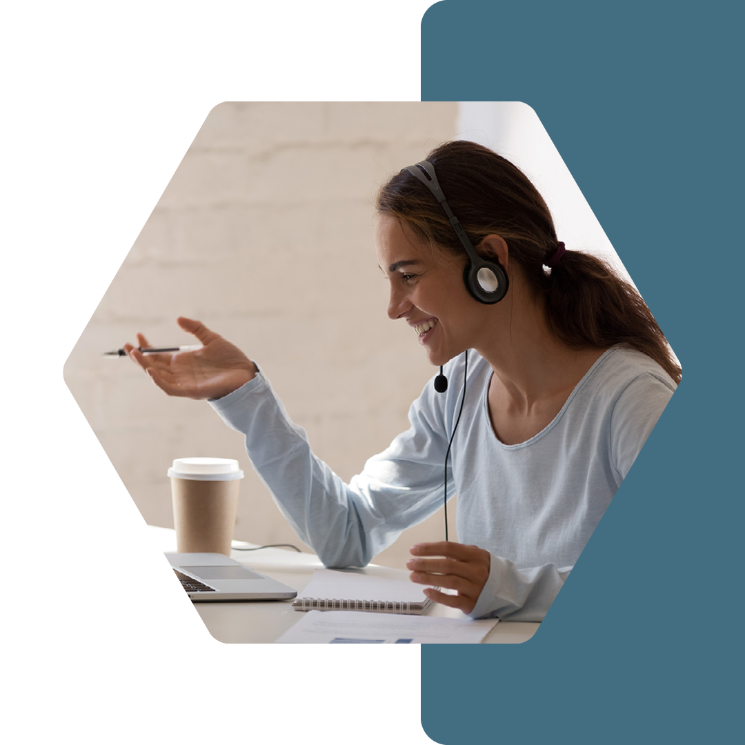 Image of a person working remotely with a headset on