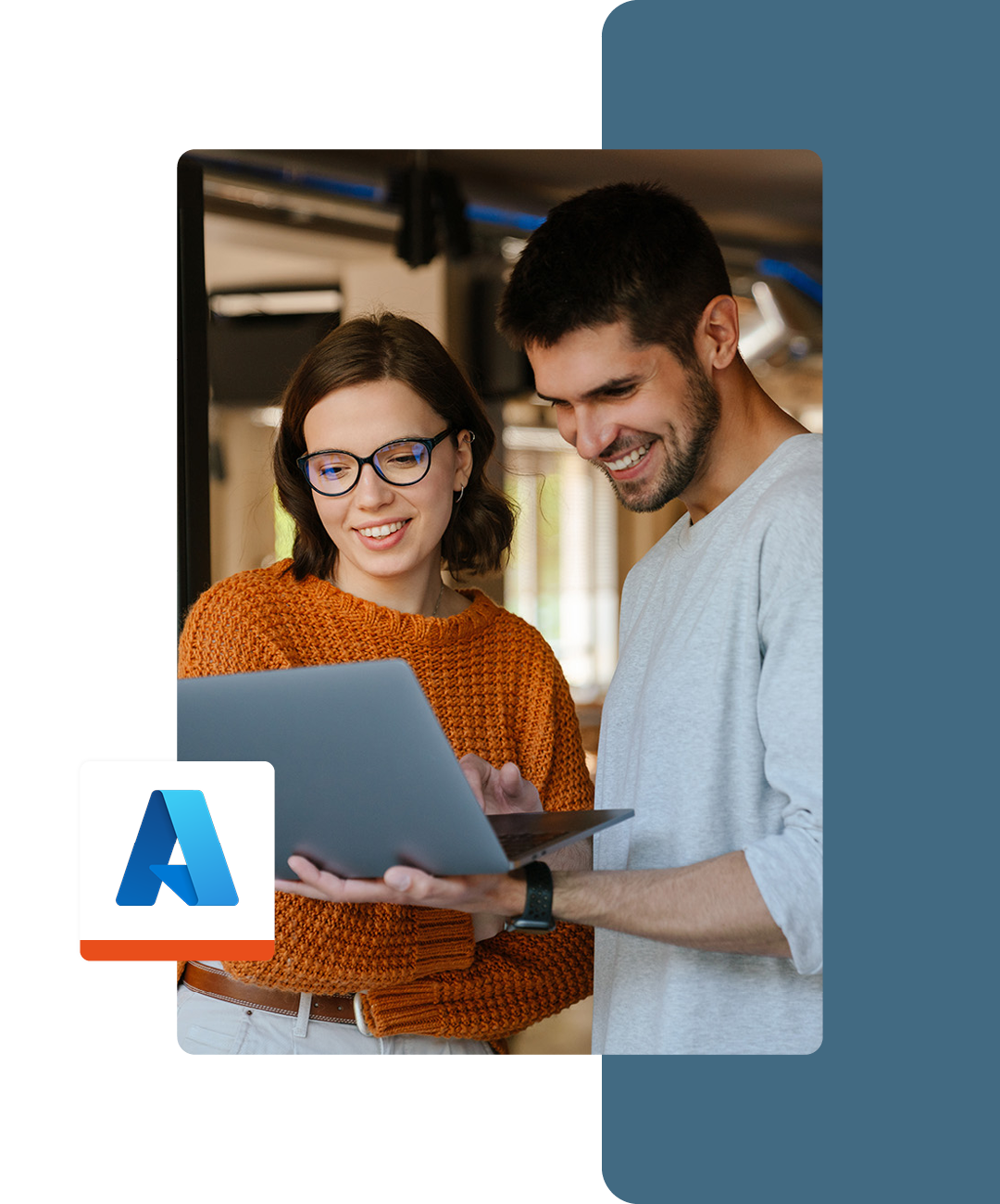 Image of two colleagues working together on a laptop