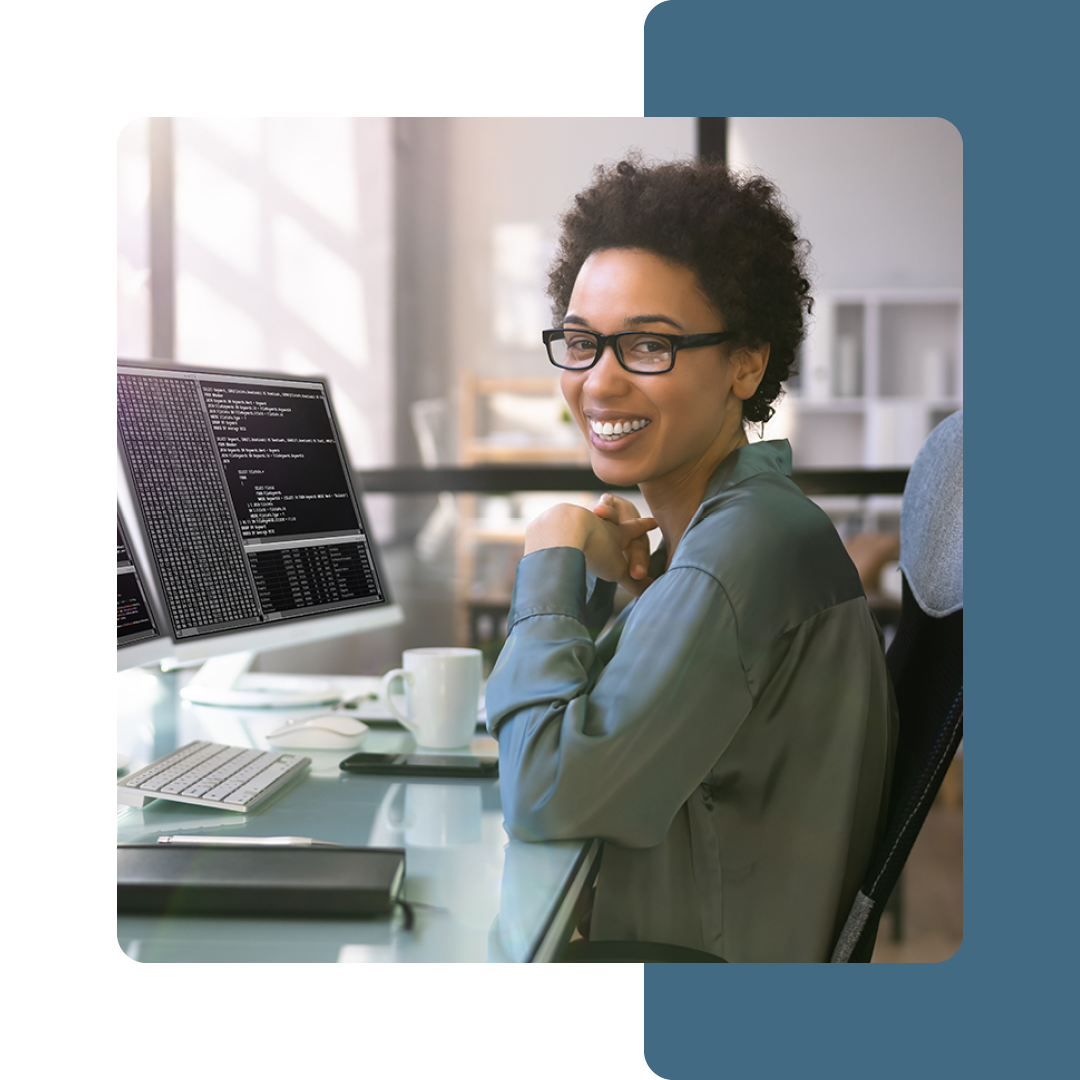 Image of a business professional sat working at a computer