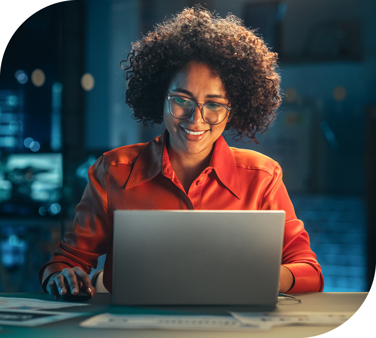 Image of a business professional working on a laptop