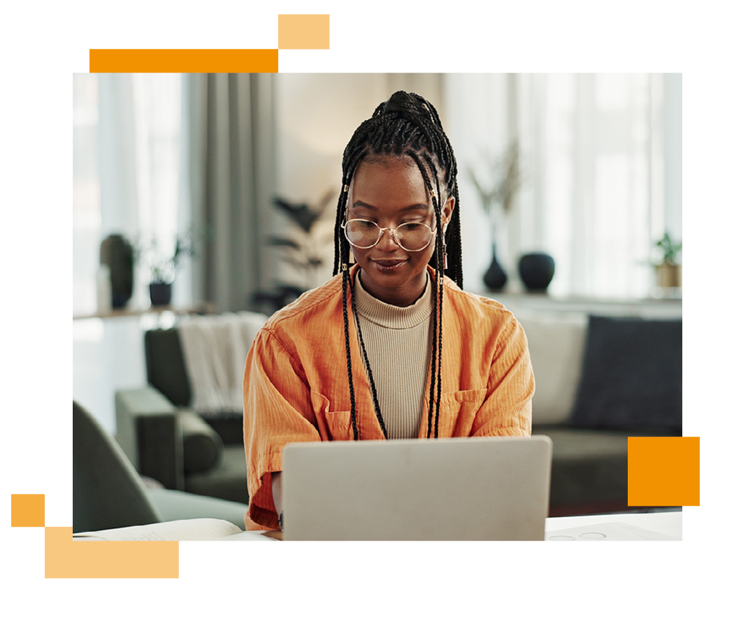 Image of a remote worker using a laptop at home