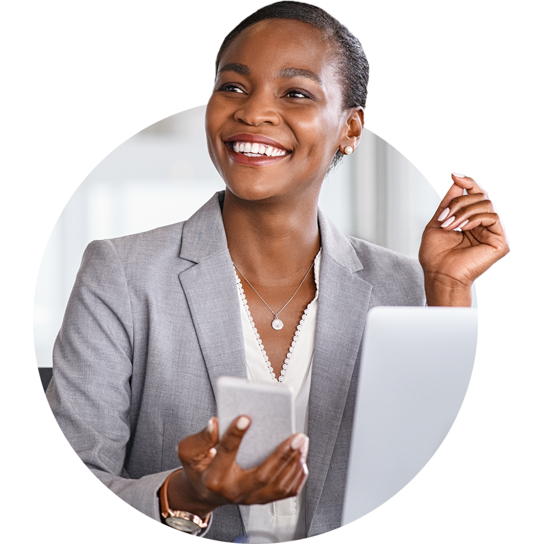 Image of a smiling working professional on their mobile phone