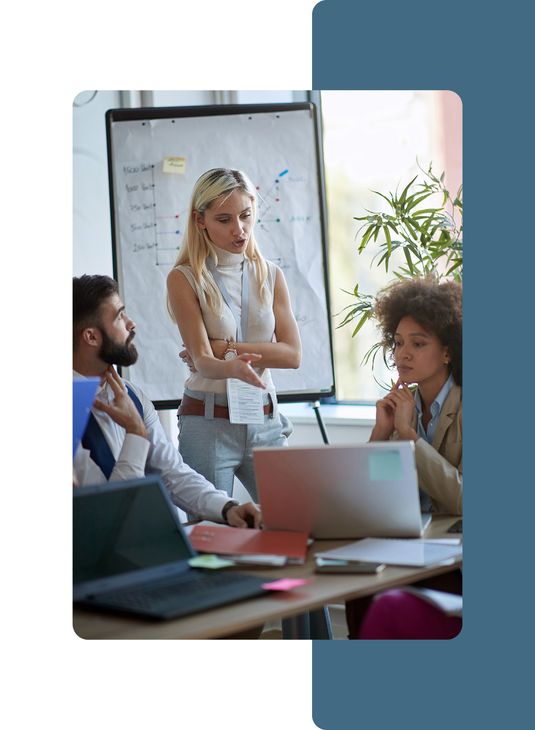 Image of a group of colleagues working together in a meeting