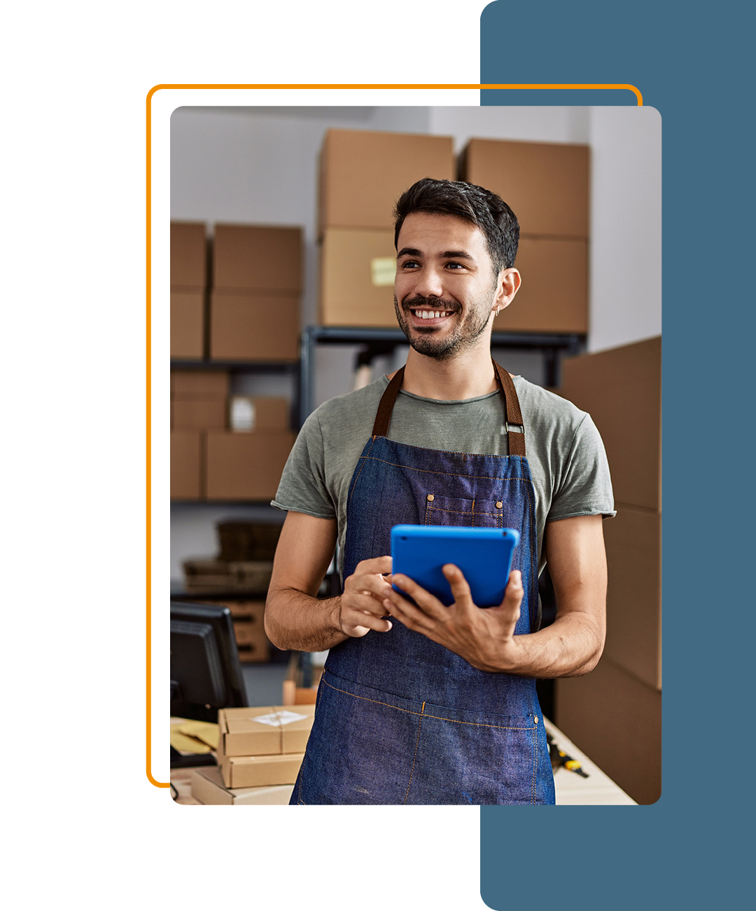 Image of a person working on a tablet in a distribution centre