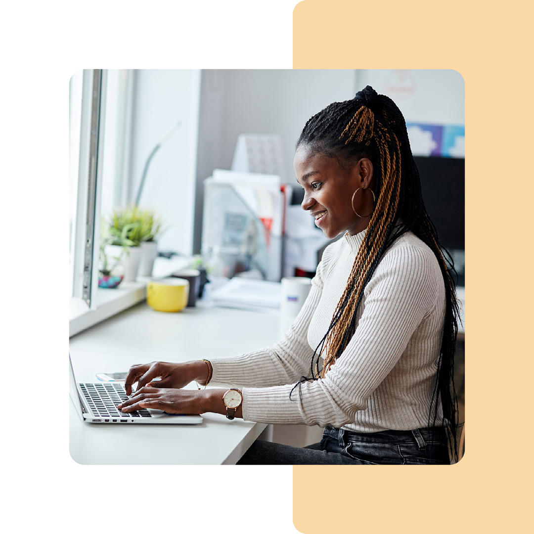 Image of a work professional working on a laptop