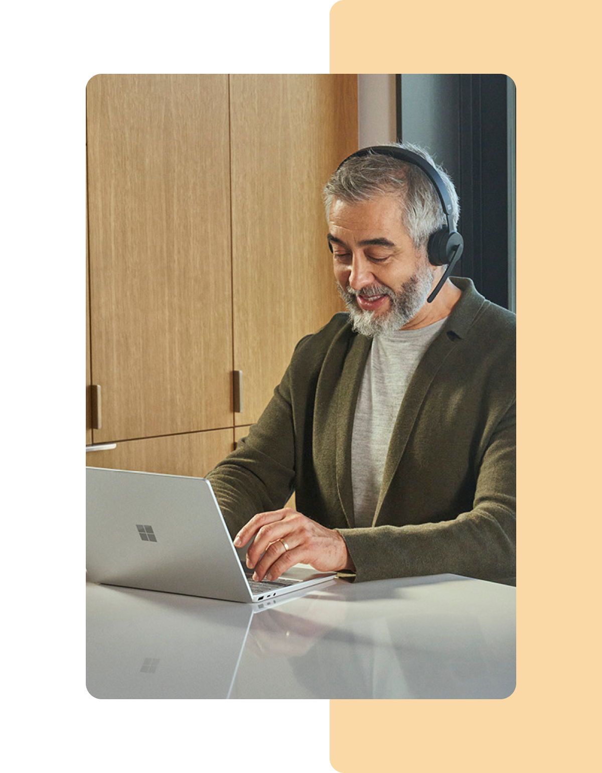 Image of a person working remotely on a Microsoft Surface laptop