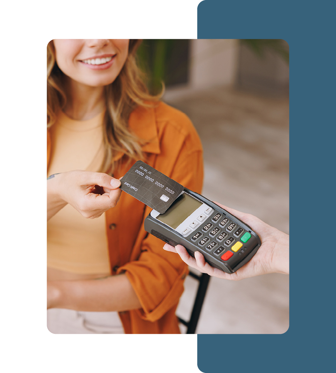 Image of a person paying on a card reader using a credit card