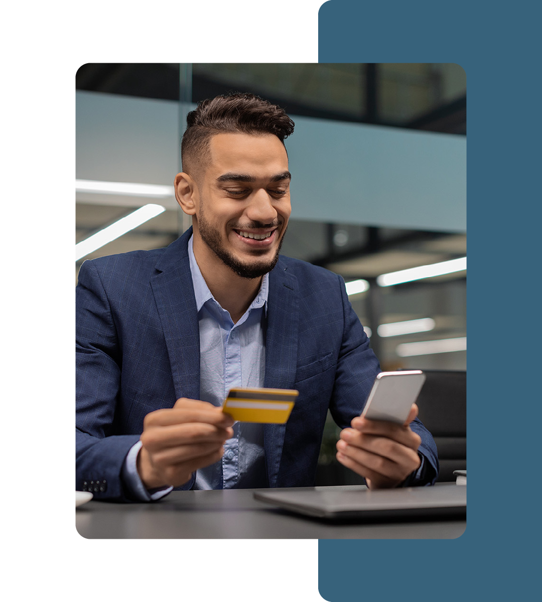 Image of a person paying on their mobile phone with a credit card