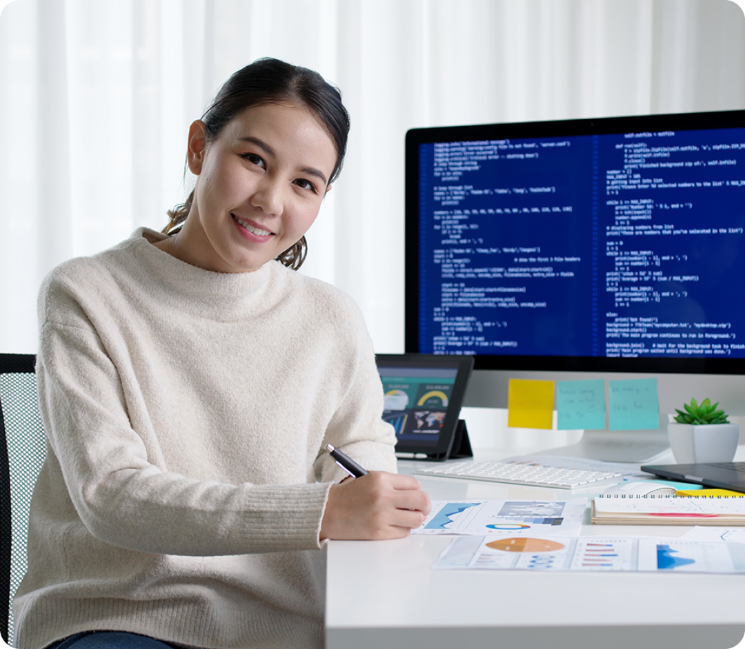 Image of a data professional looking at data on a computer