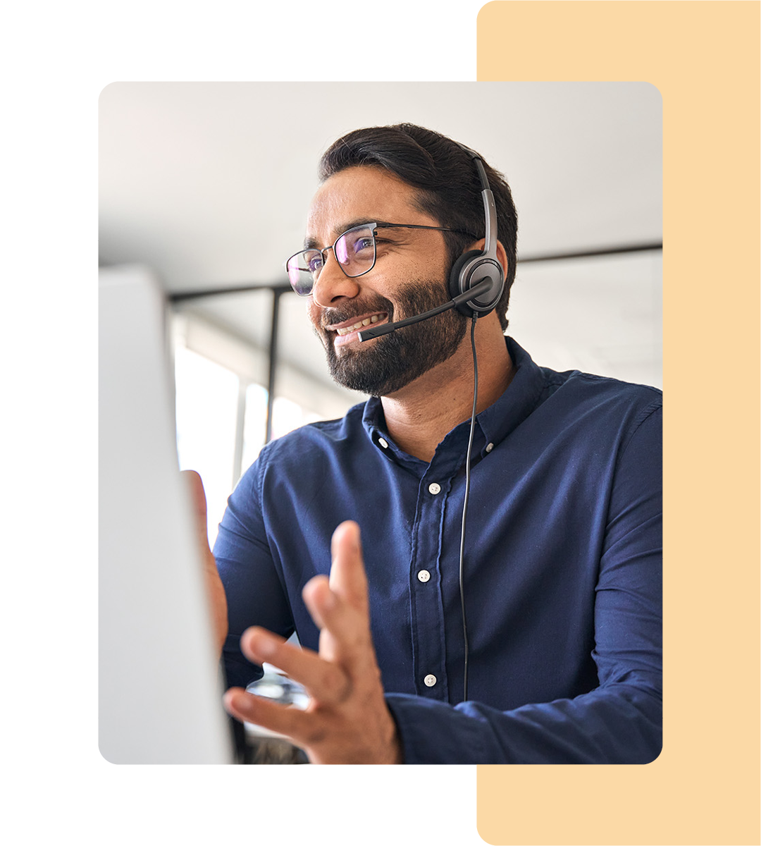 Image of an IT support professional talking on a headset