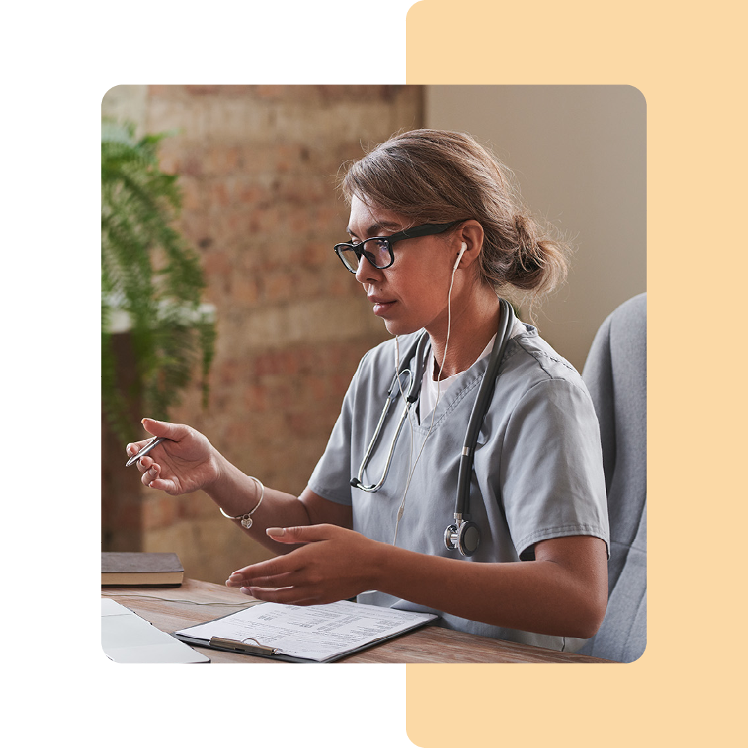 Image of a doctor talking on a virtual meeting