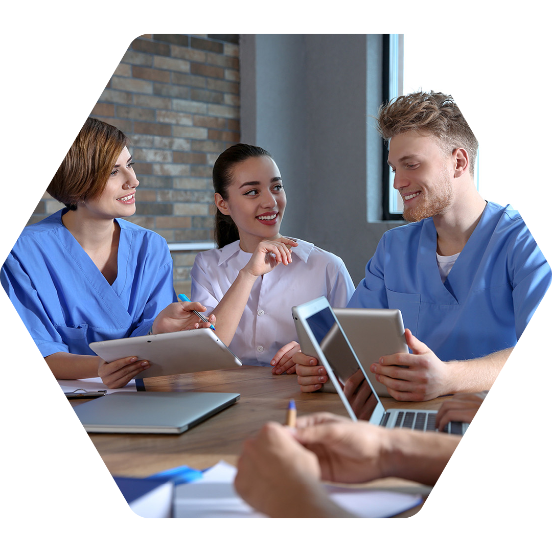 Image of a group of doctors sat in a meeting