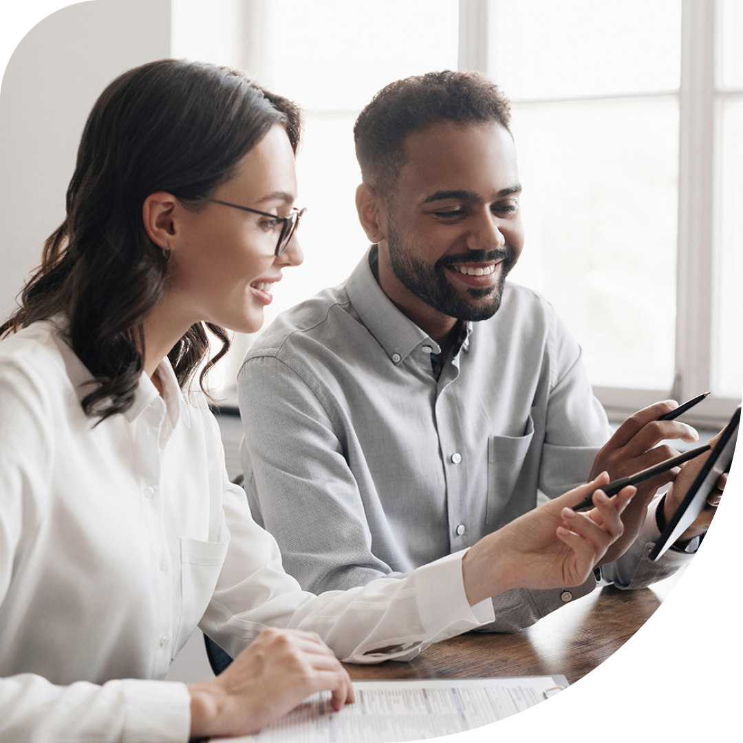 Image of two business colleagues sat working together