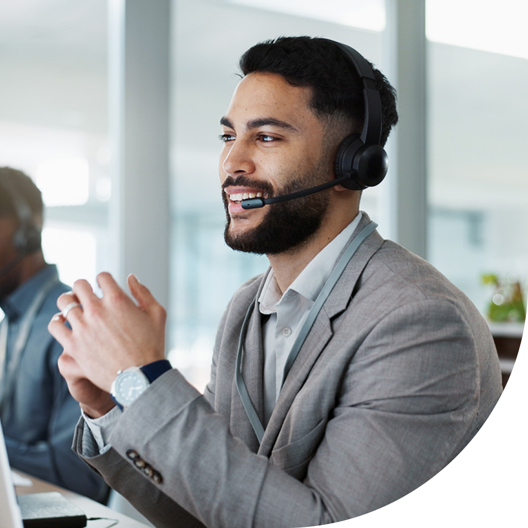 Image of an IT support professional talking on a headset