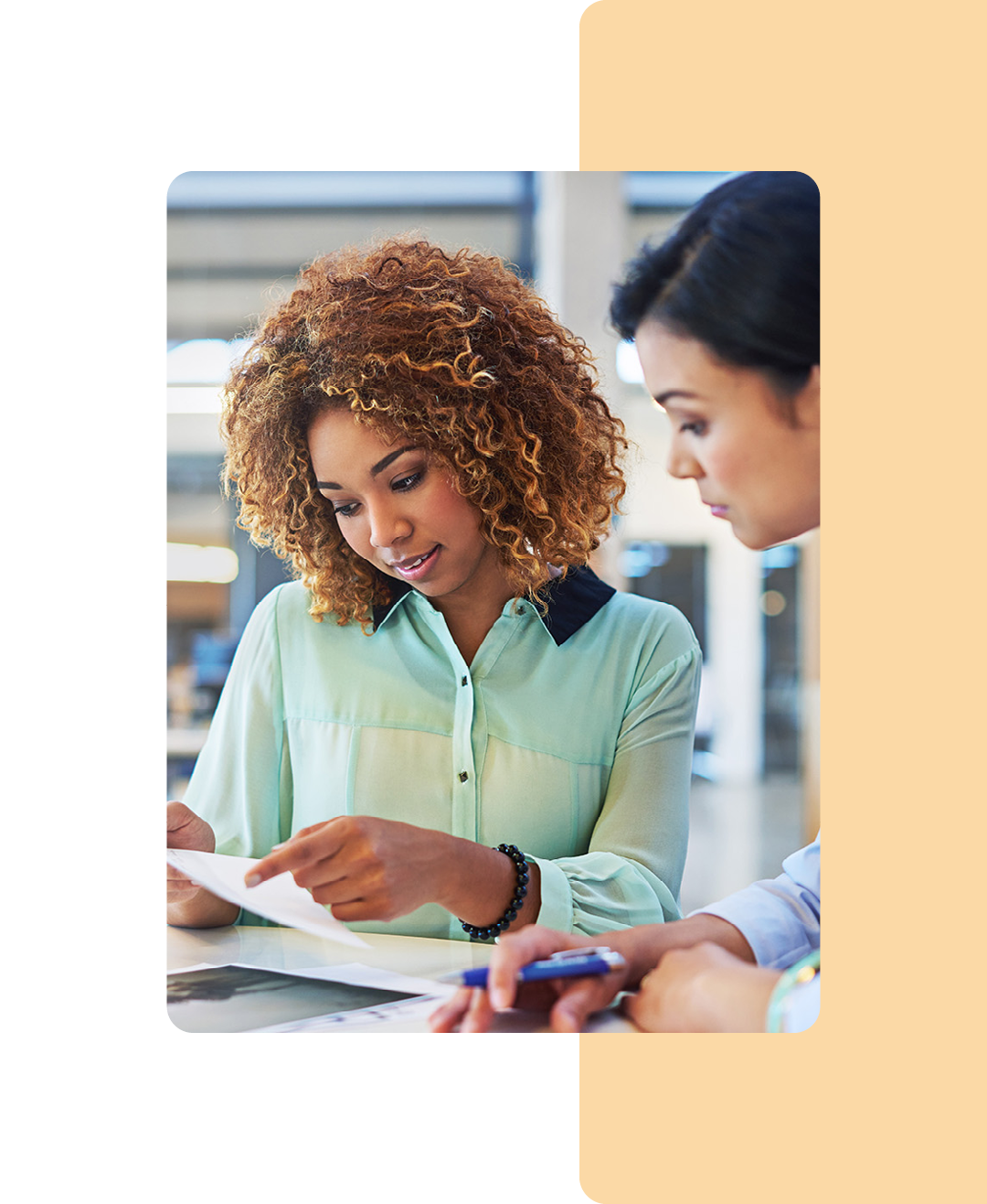 Image of a human resources employees talking to a colleague