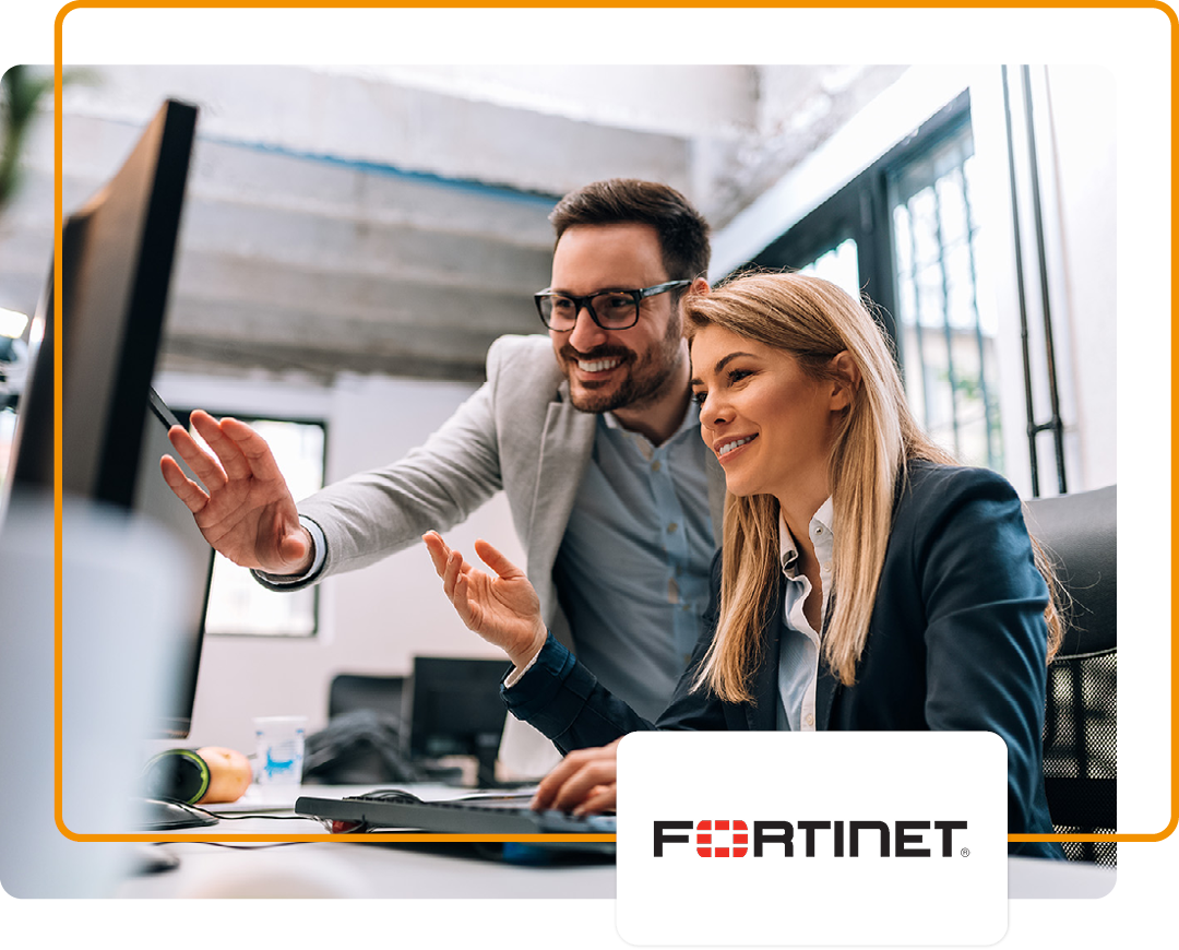 Image of two colleagues working together on a computer with the Fortinet logo