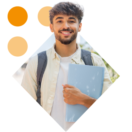 Image of a smiling university student holding a laptop