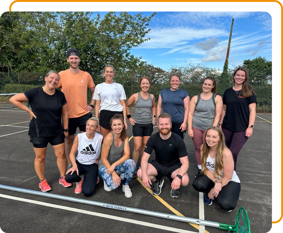 Image of Phoenix Software employees at a charity netball match