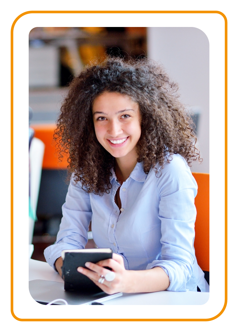 Business woman working at the office using notepad