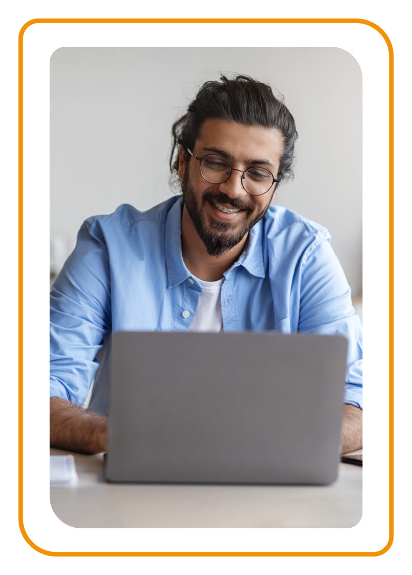 Man Working On Computer At Home Office